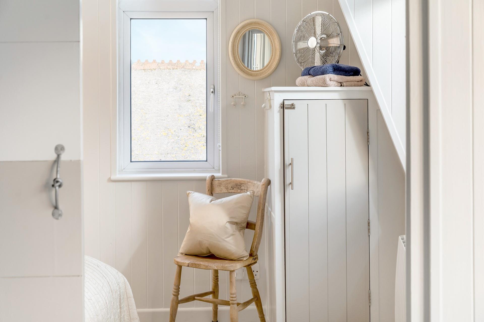 We love the calming choice of colours in bedroom 1.