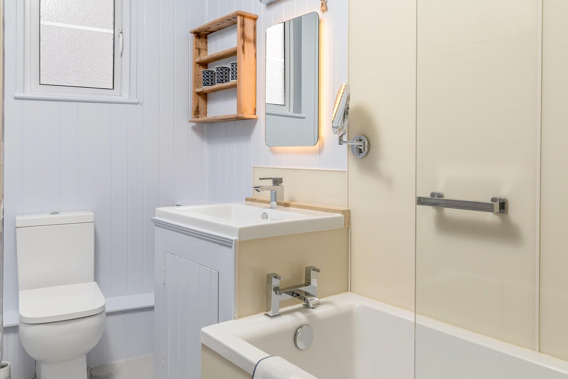 Shelving provides room for your toiletries. 