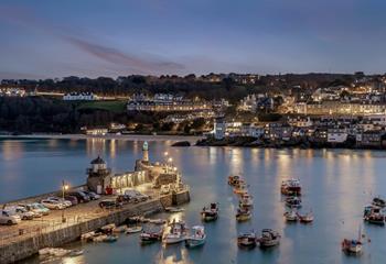 As evening sets in, watch as St Ives becomes a town of twinkling lights. 