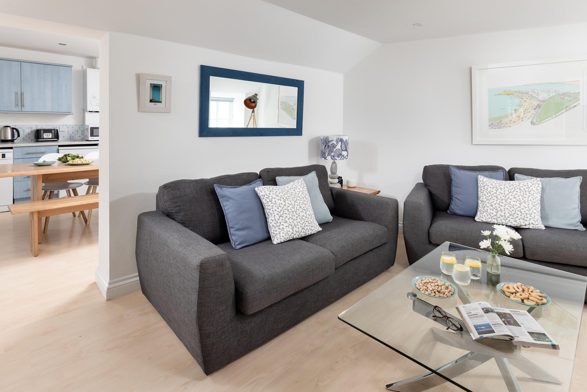 Step from the sitting room into the light and airy kitchen.