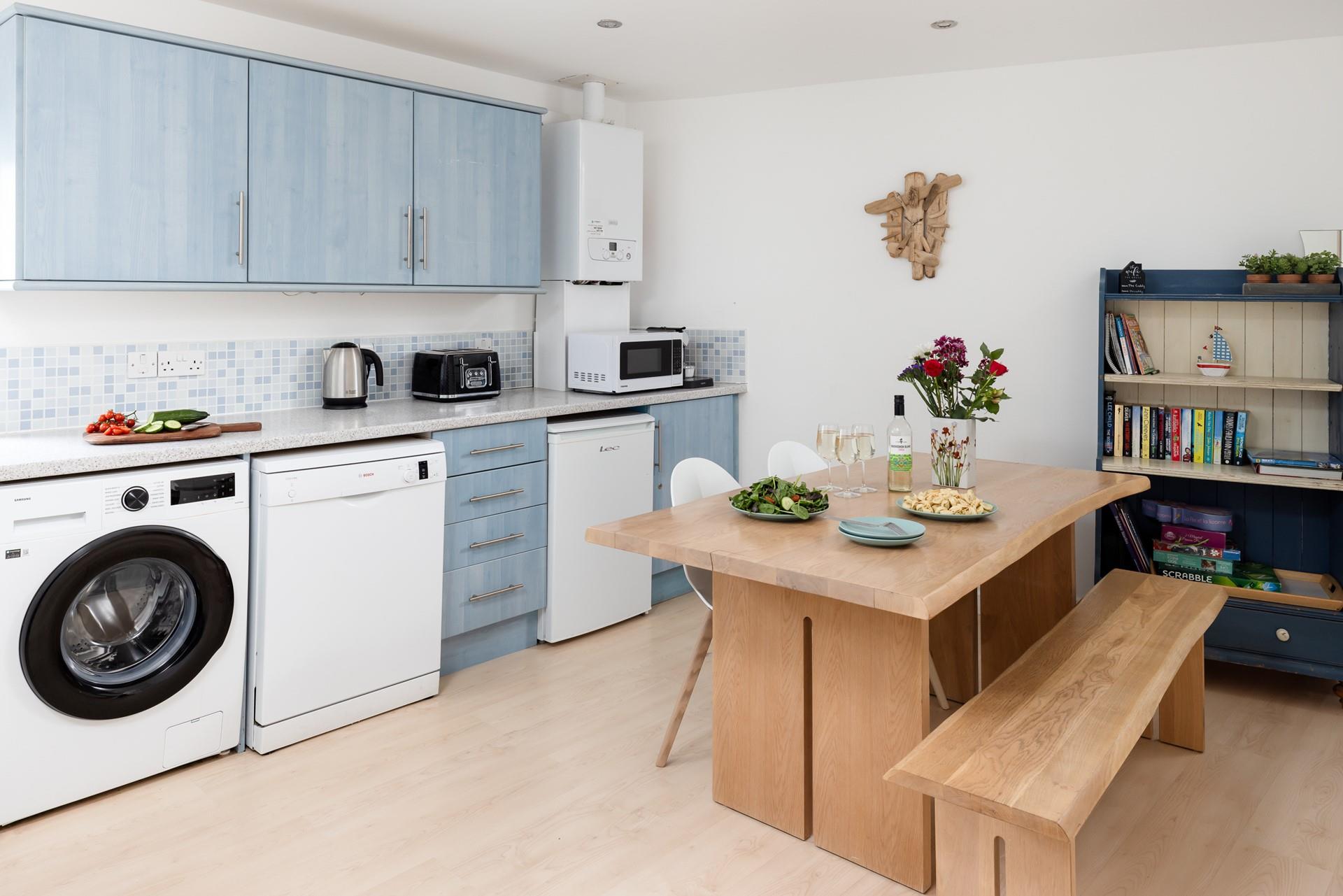 The kitchen has all you need for a relaxing stay.