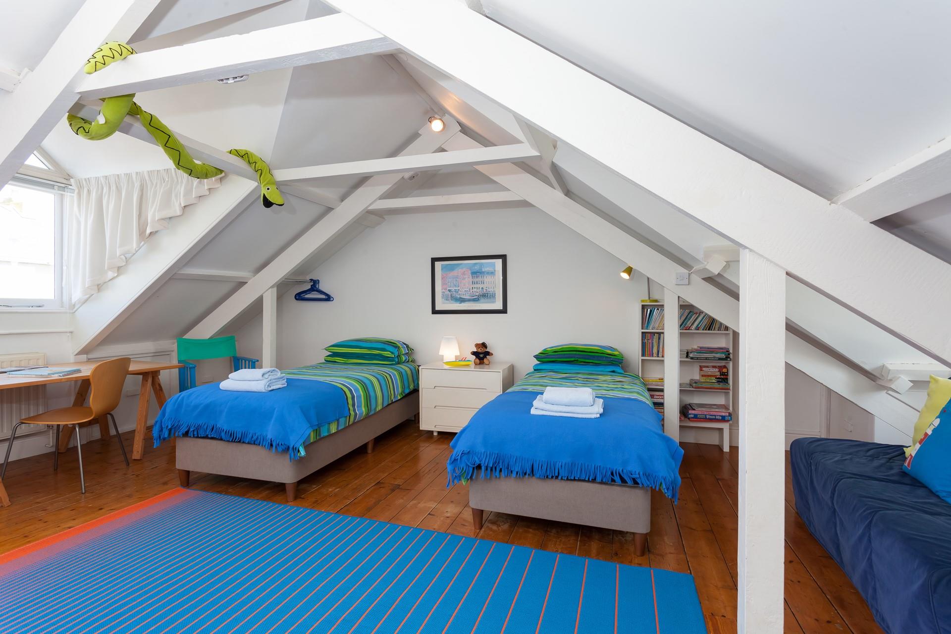 An ideal bedroom for the children in the party, the games provided should keep them busy for hours!