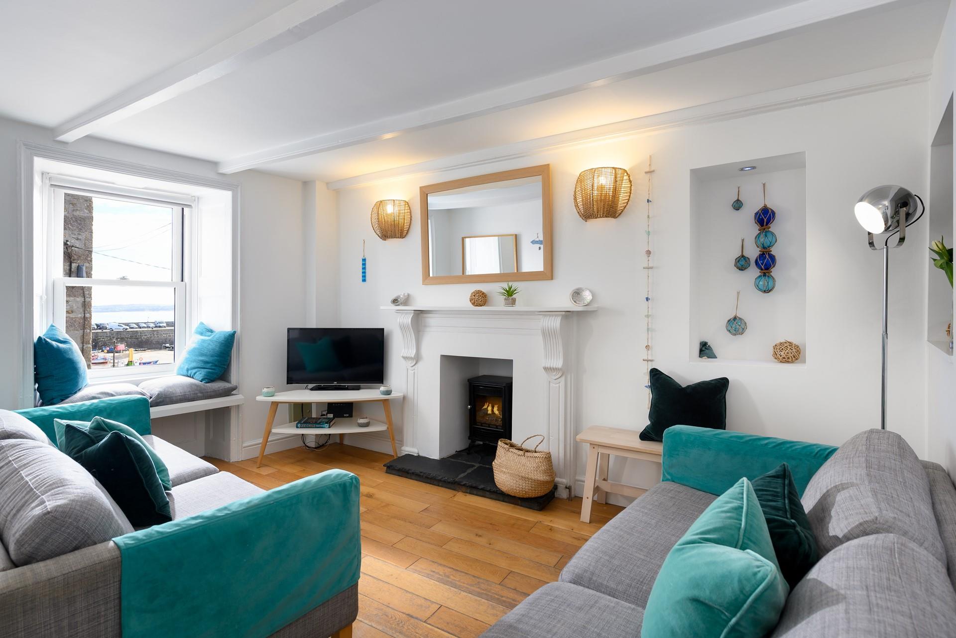 Decorated in seaside tones, the lounge is a welcoming space, perfect for the whole family to gather together.