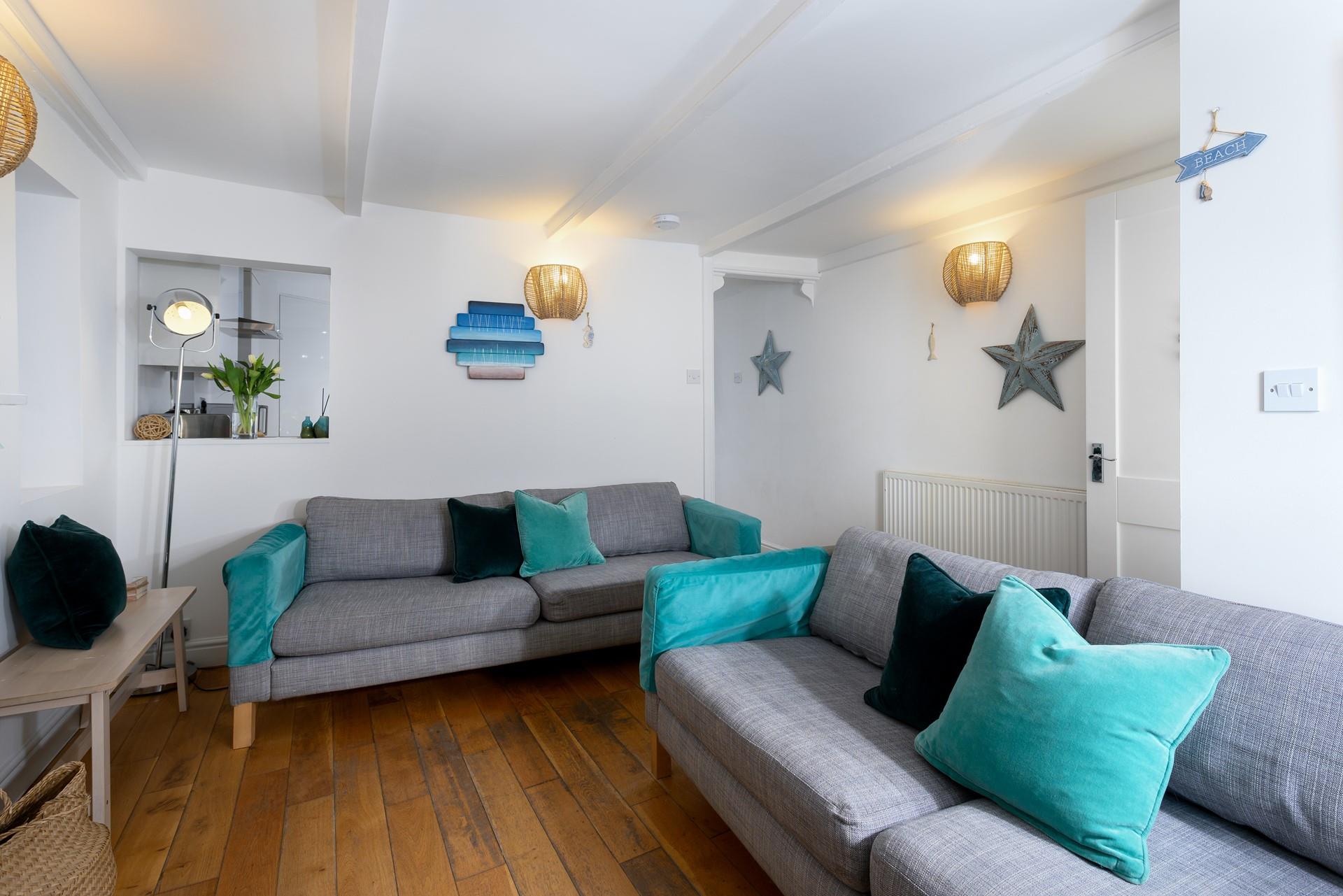 The property is the perfect light and breezy summer retreat or pop the stove on and it becomes a cosy winter haven.