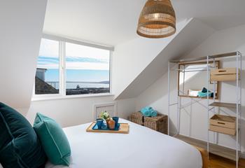 This bedroom benefits from harbour views, allowing you to wake up and enjoy some time wave watching.