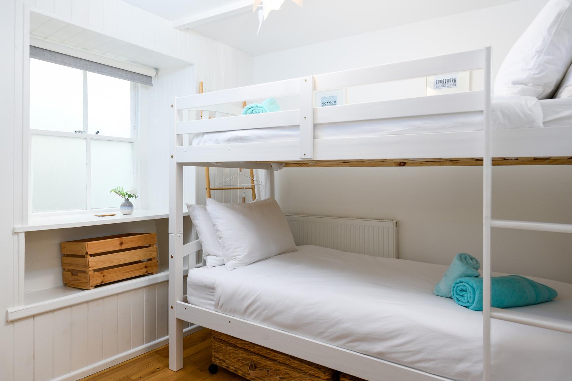 The bunk bedroom is ideal for kids or teenagers.