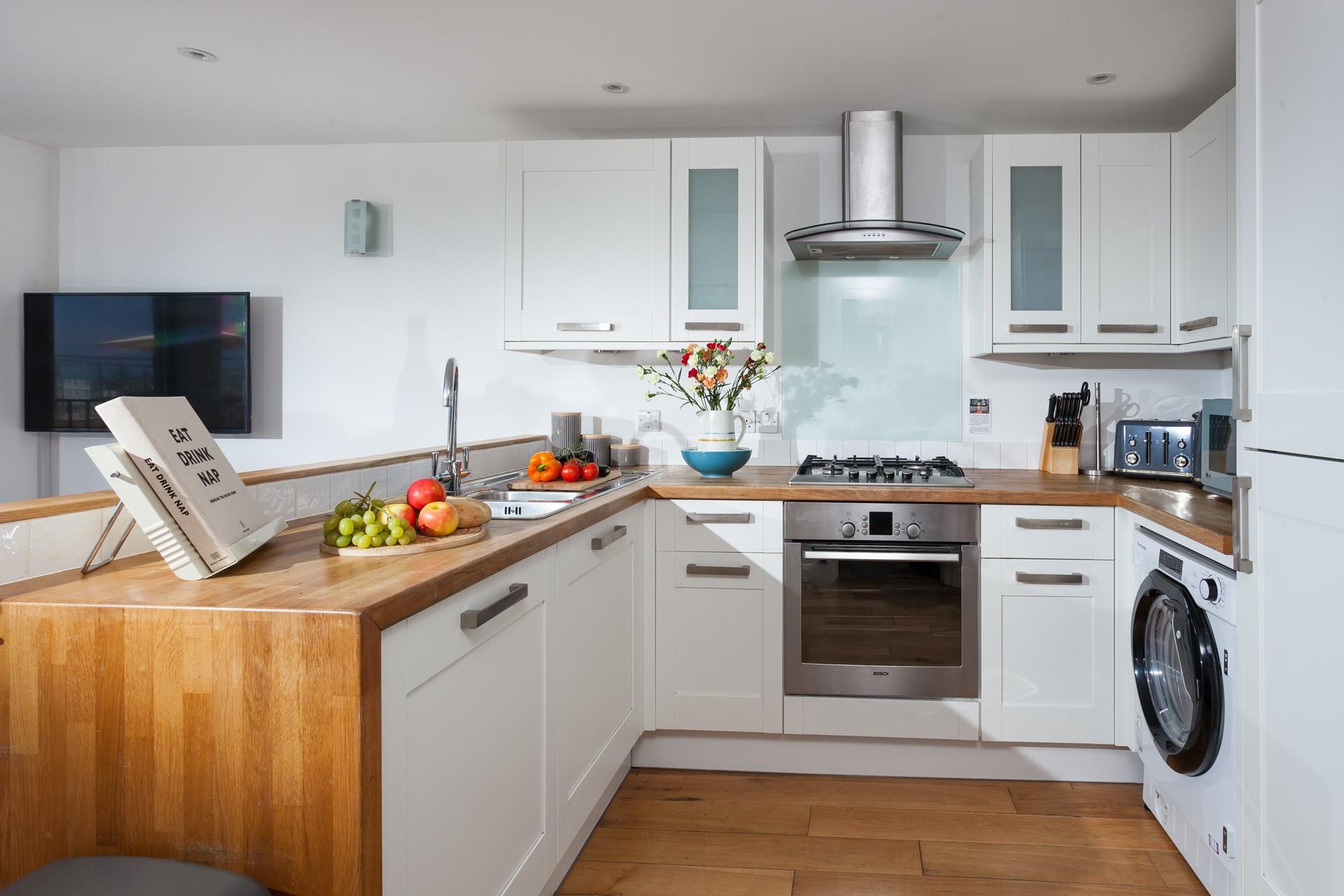 Beautifully designed, the kitchen is sure to delight anyone who enjoys cooking.