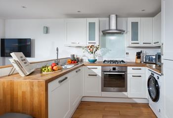 Beautifully designed, the kitchen is sure to delight anyone who enjoys cooking.