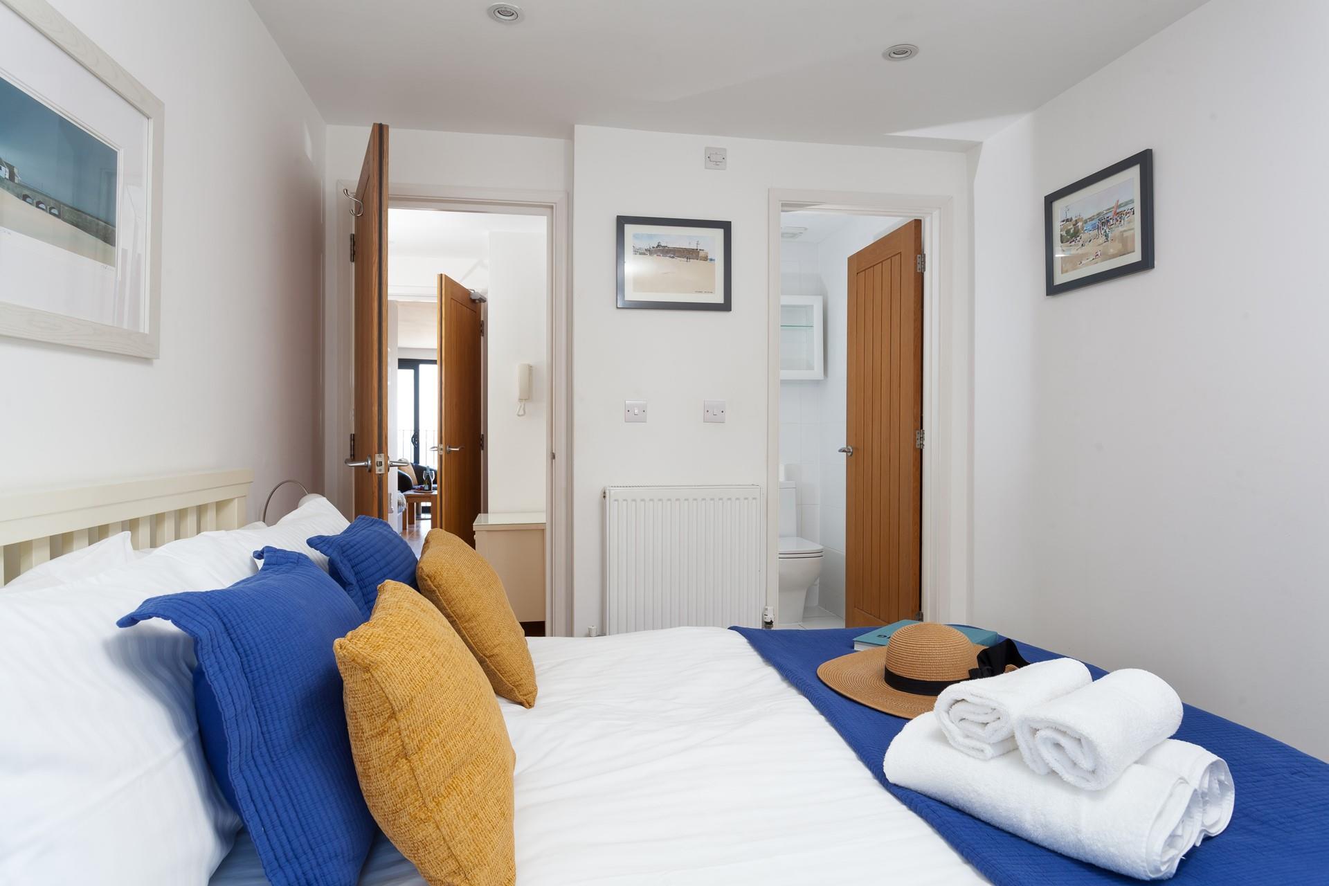 The bedroom has a convenient ensuite. 