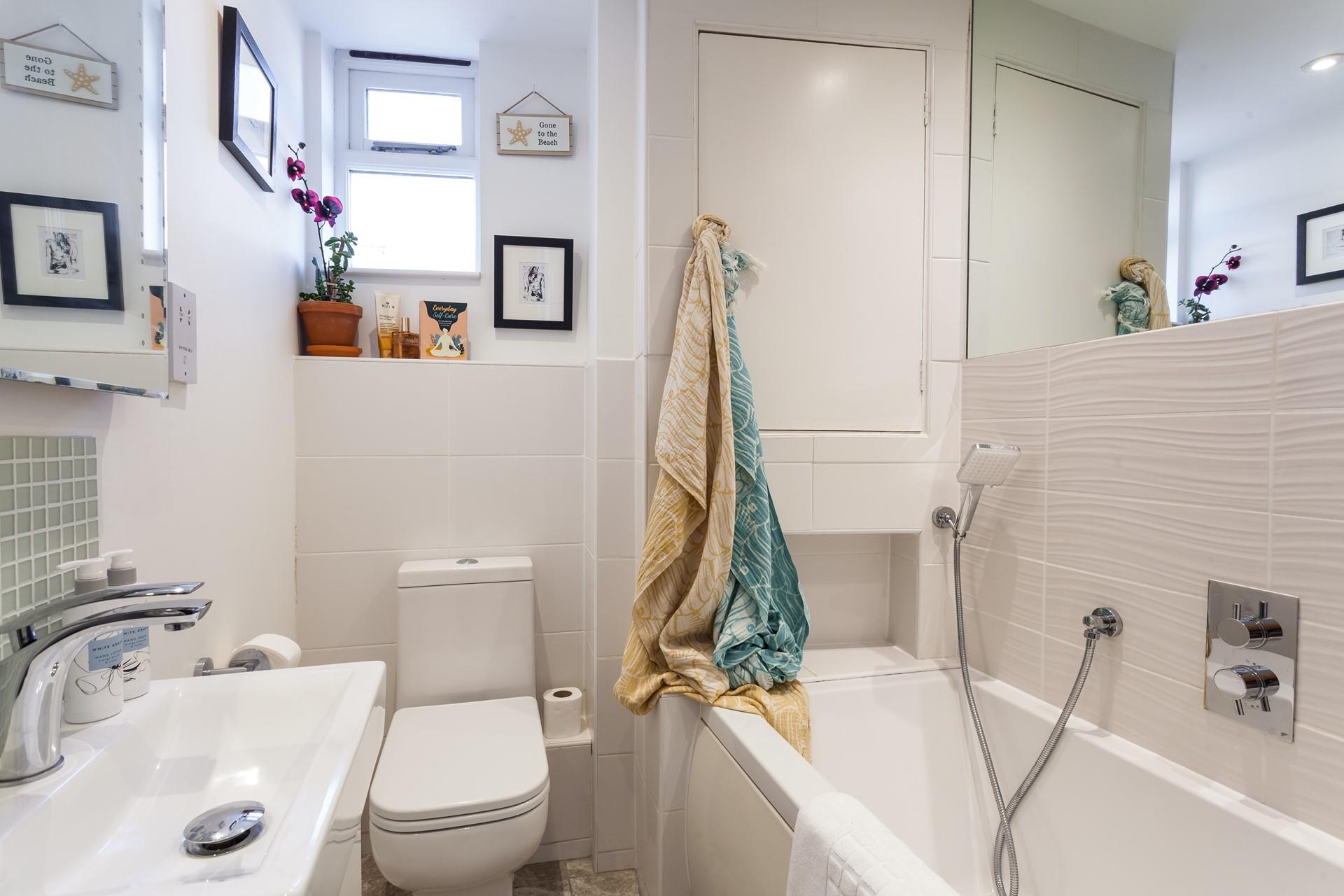 The main bathroom and an additional shower room offer guests plenty of space to get ready for the day ahead. 
