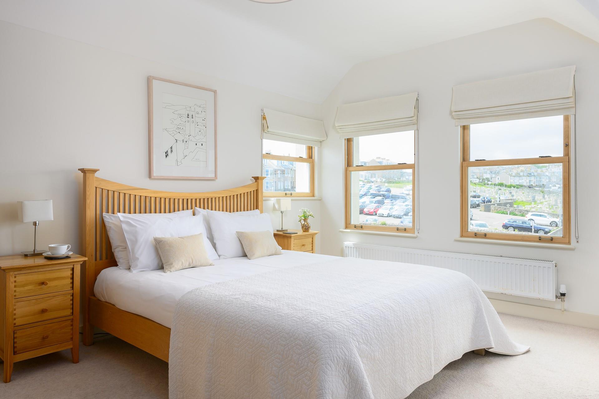 Sink into the soft sheets of the king size bed and enjoy a peaceful night's slumber.