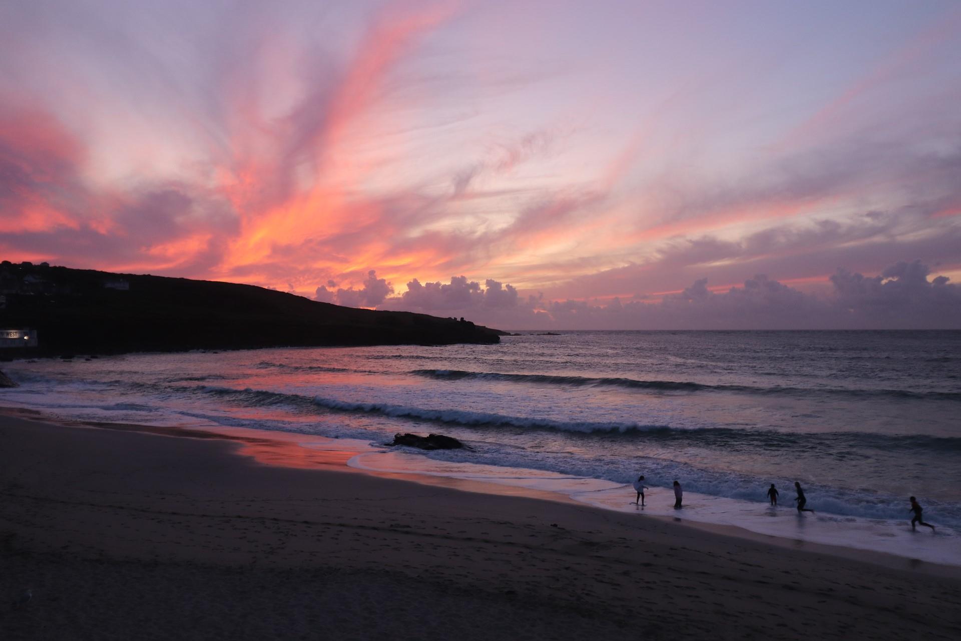 Watch a stunning sunset on the beach before wandering back to your apartment to cosy into bed.