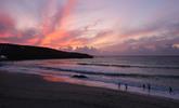 Watch a stunning sunset on the beach before wandering back to your apartment to cosy into bed. - Thumbnail Image