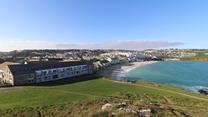 Why not learn a new skill on your holiday? Surfing is popular at Porthmeor beach.