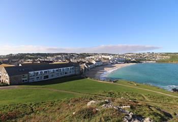 Why not learn a new skill on your holiday? Surfing is popular at Porthmeor beach.