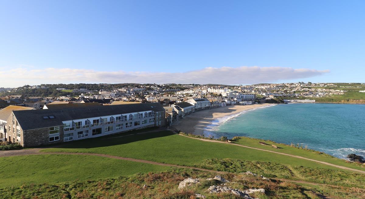 Why not learn a new skill on your holiday? Surfing is popular at Porthmeor beach.