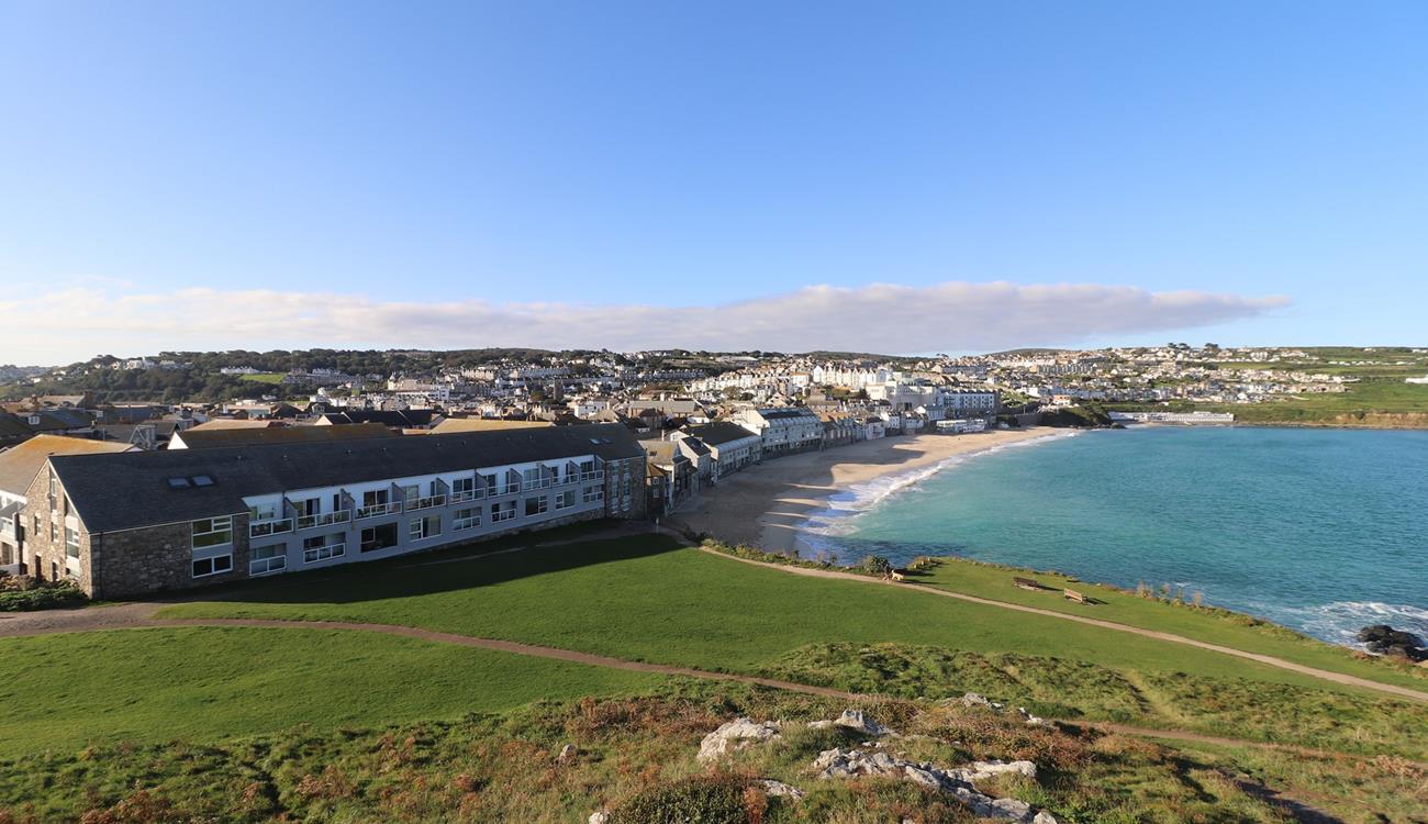 Why not learn a new skill on your holiday? Surfing is popular at Porthmeor beach.