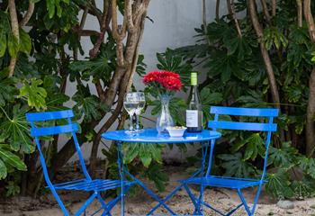 Catch the last of the evening sun in the communal courtyard.