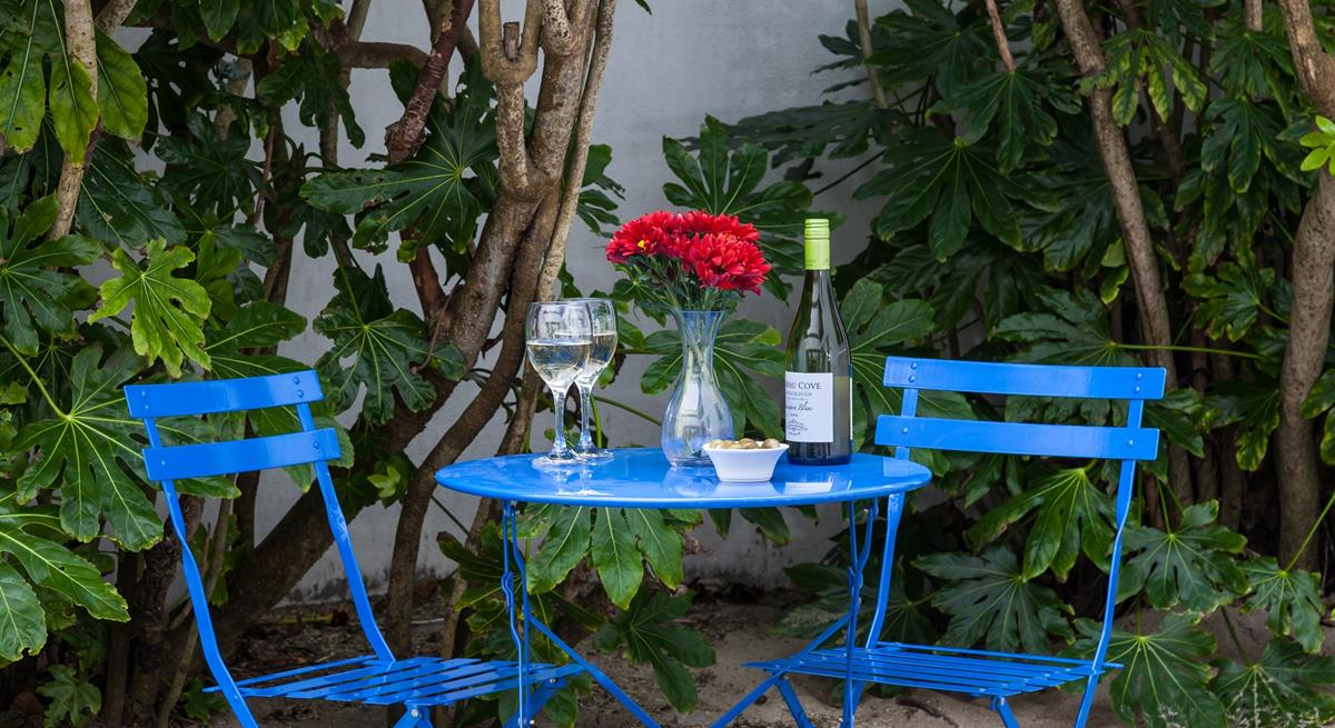 Catch the last of the evening sun in the communal courtyard.