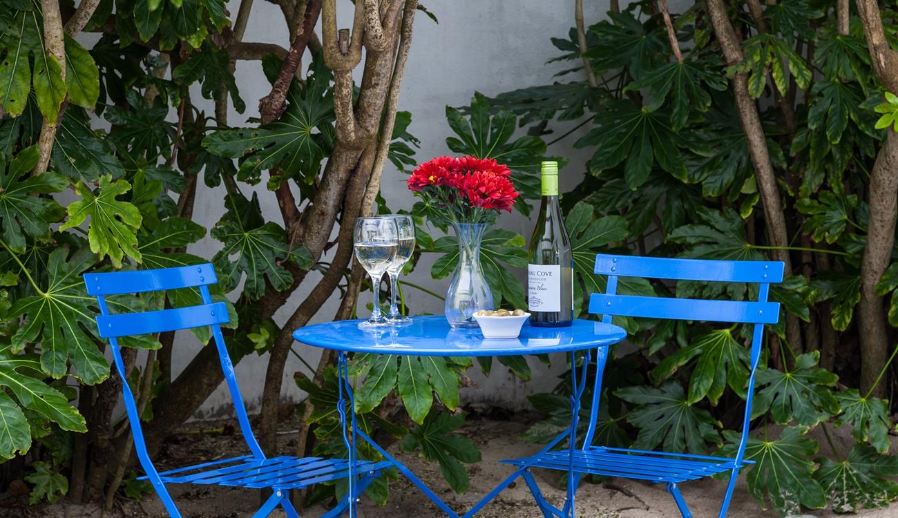 Catch the last of the evening sun in the communal courtyard.