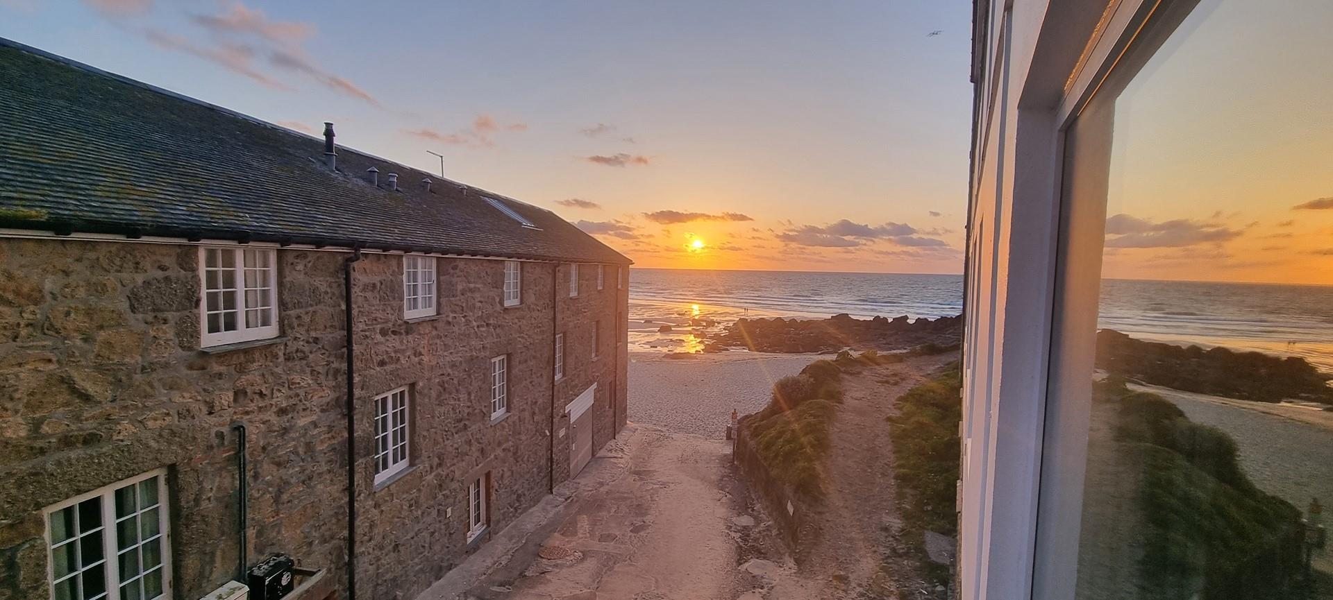 Watch the sunset over Porthmeor Beach to top off a memorable day.