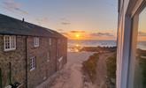 Watch the sunset over Porthmeor Beach to top off a memorable day. - Thumbnail Image