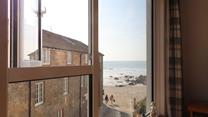 Gaze out at sea from your sitting room window, then wander down in the sunshine.