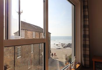 Gaze out at sea from your sitting room window, then wander down in the sunshine.