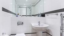 Get ready to head out for the day in the family shower room.