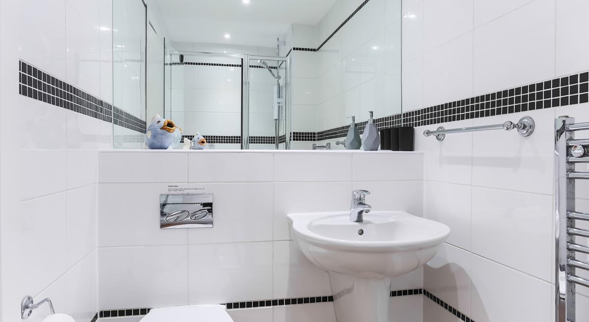 Get ready to head out for the day in the family shower room.