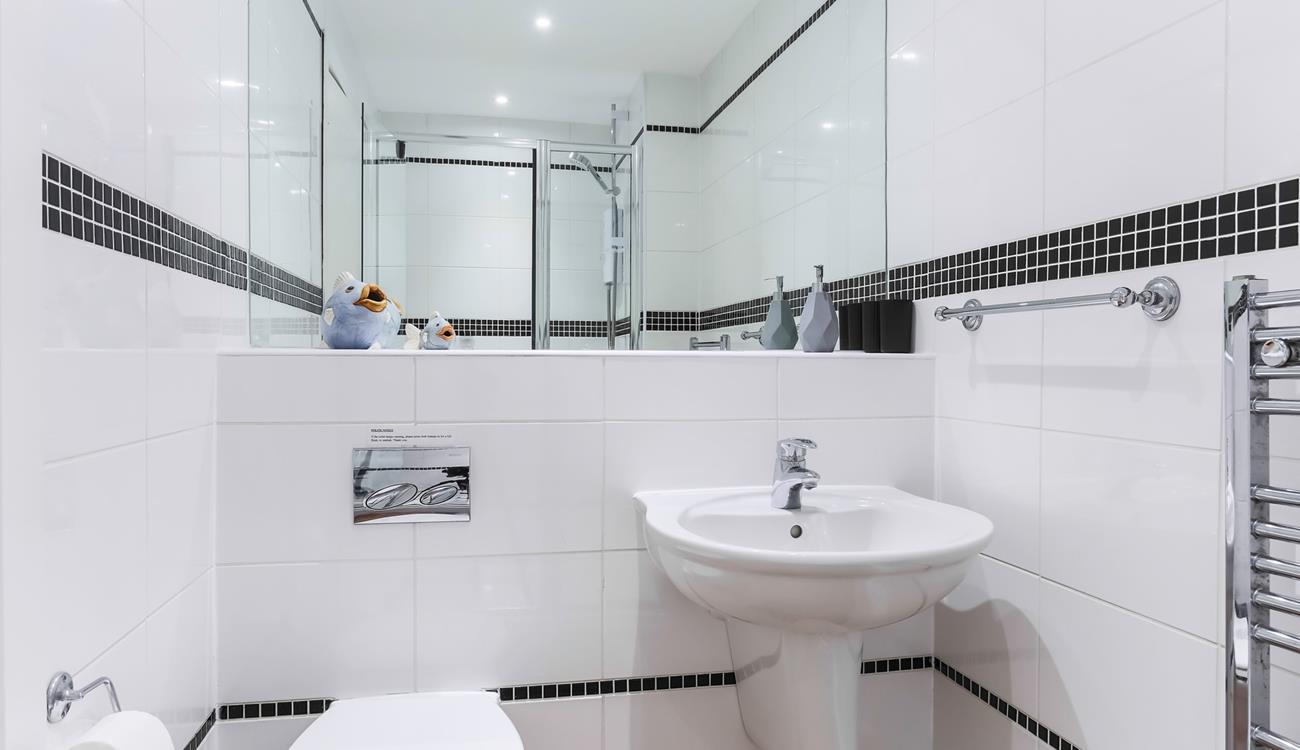 Get ready to head out for the day in the family shower room.