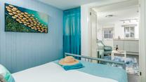 The bedroom is conveniently located on the same level as the living area. 