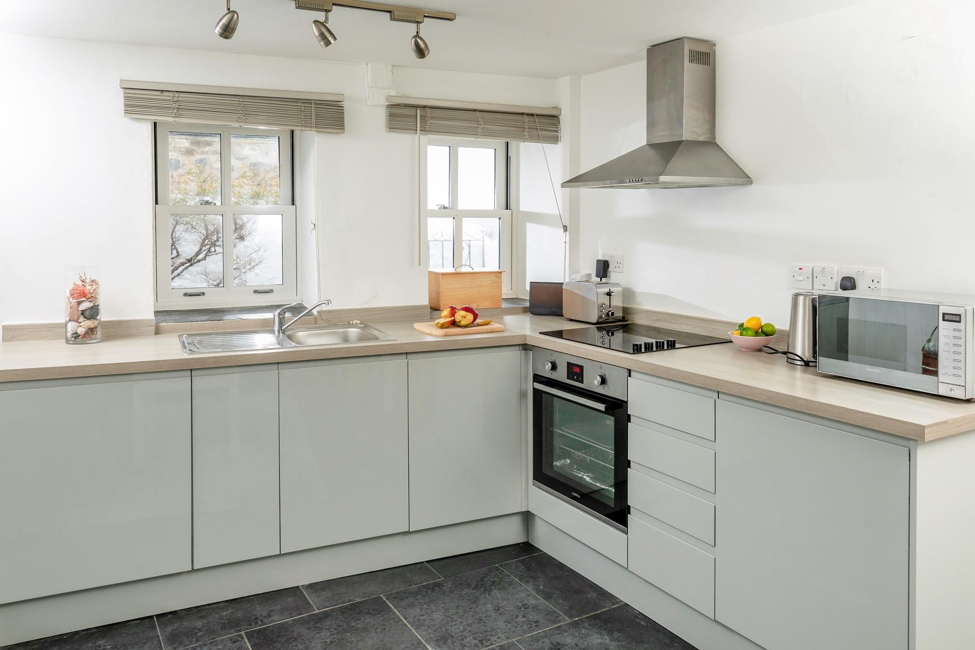 Find everything you need in the spacious kitchen to cook a delicious meal. 