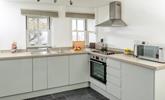 Find everything you need in the spacious kitchen to cook a delicious meal.  - Thumbnail Image