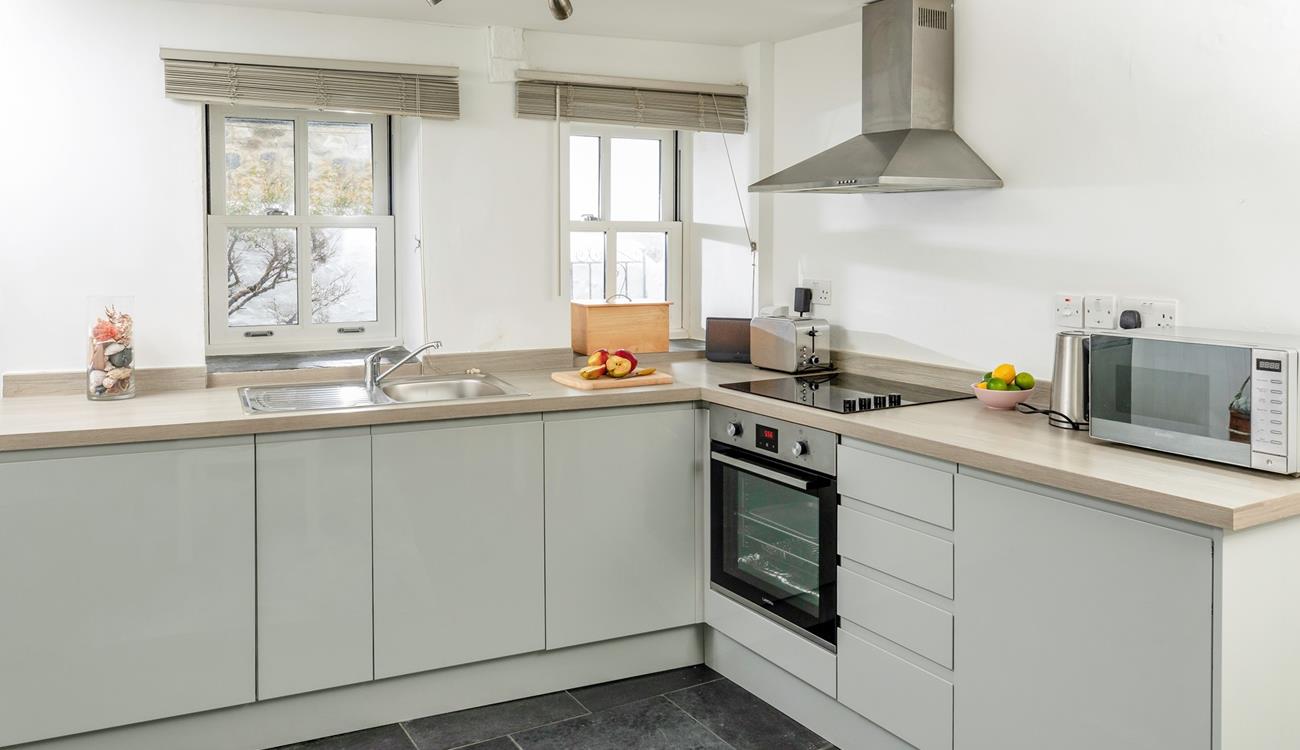 Find everything you need in the spacious kitchen to cook a delicious meal. 