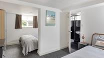Bedroom 2 has a handy en suite and plenty of storage.