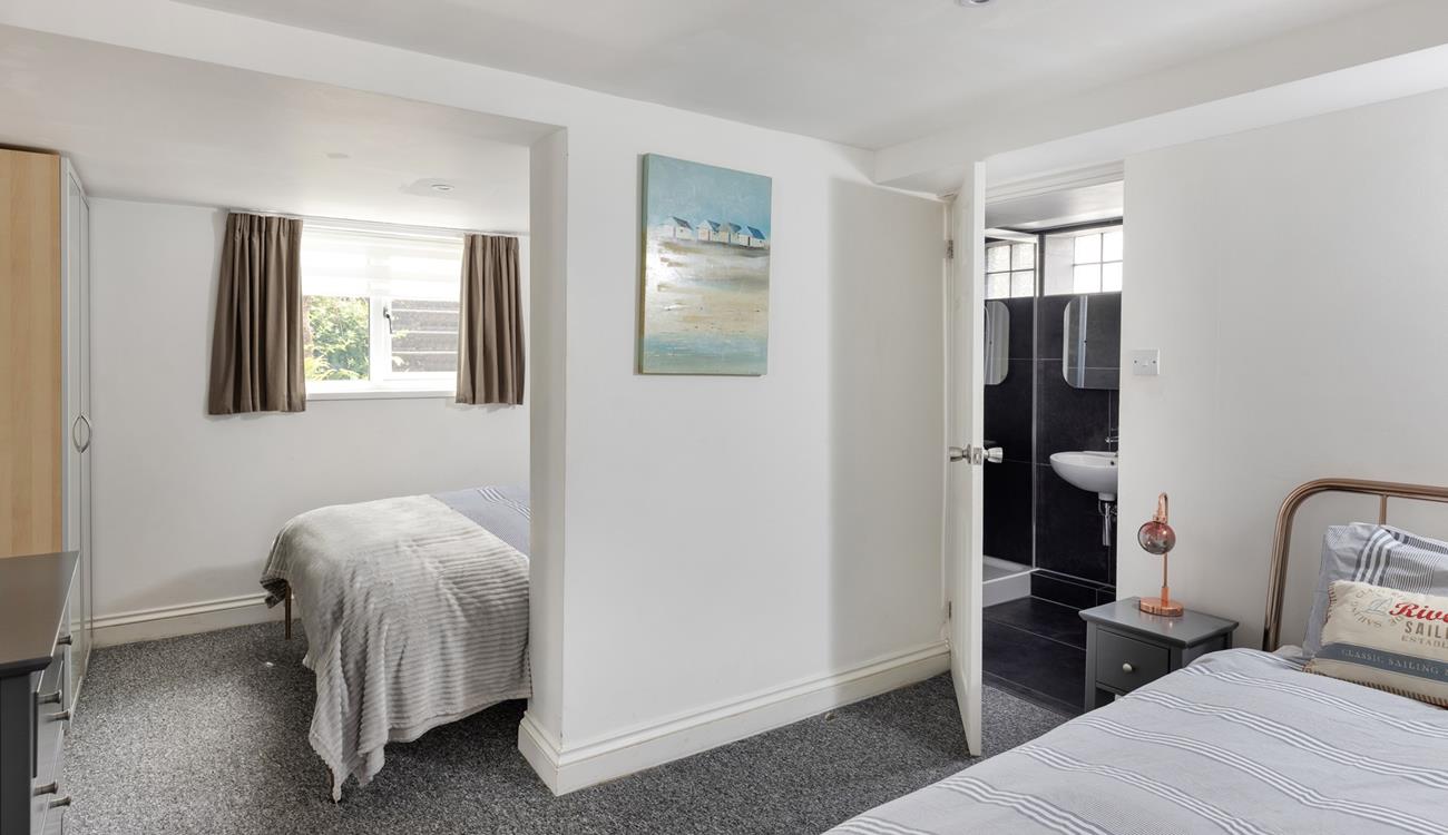 Bedroom 2 has a handy en suite and plenty of storage.