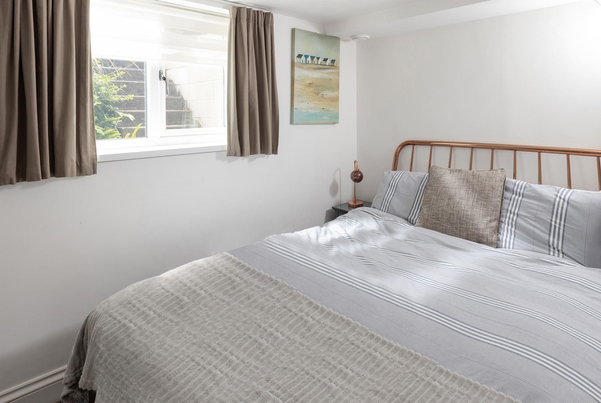 Drift off in the comfortable double bed after a day on the beach.