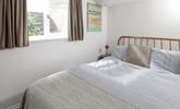 Drift off in the comfortable double bed after a day on the beach. - Thumbnail Image