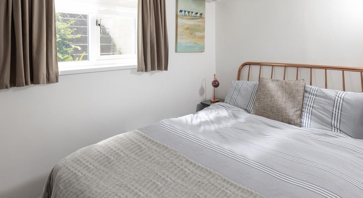 Drift off in the comfortable double bed after a day on the beach.