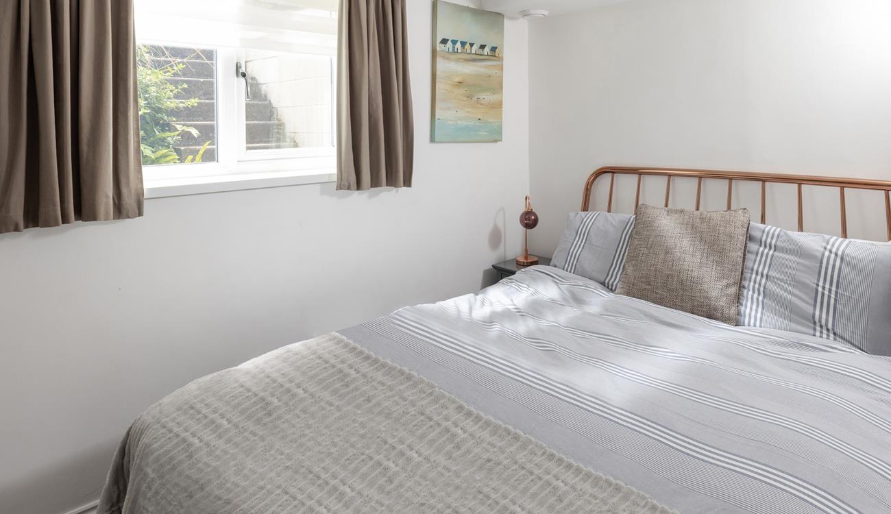 Drift off in the comfortable double bed after a day on the beach.