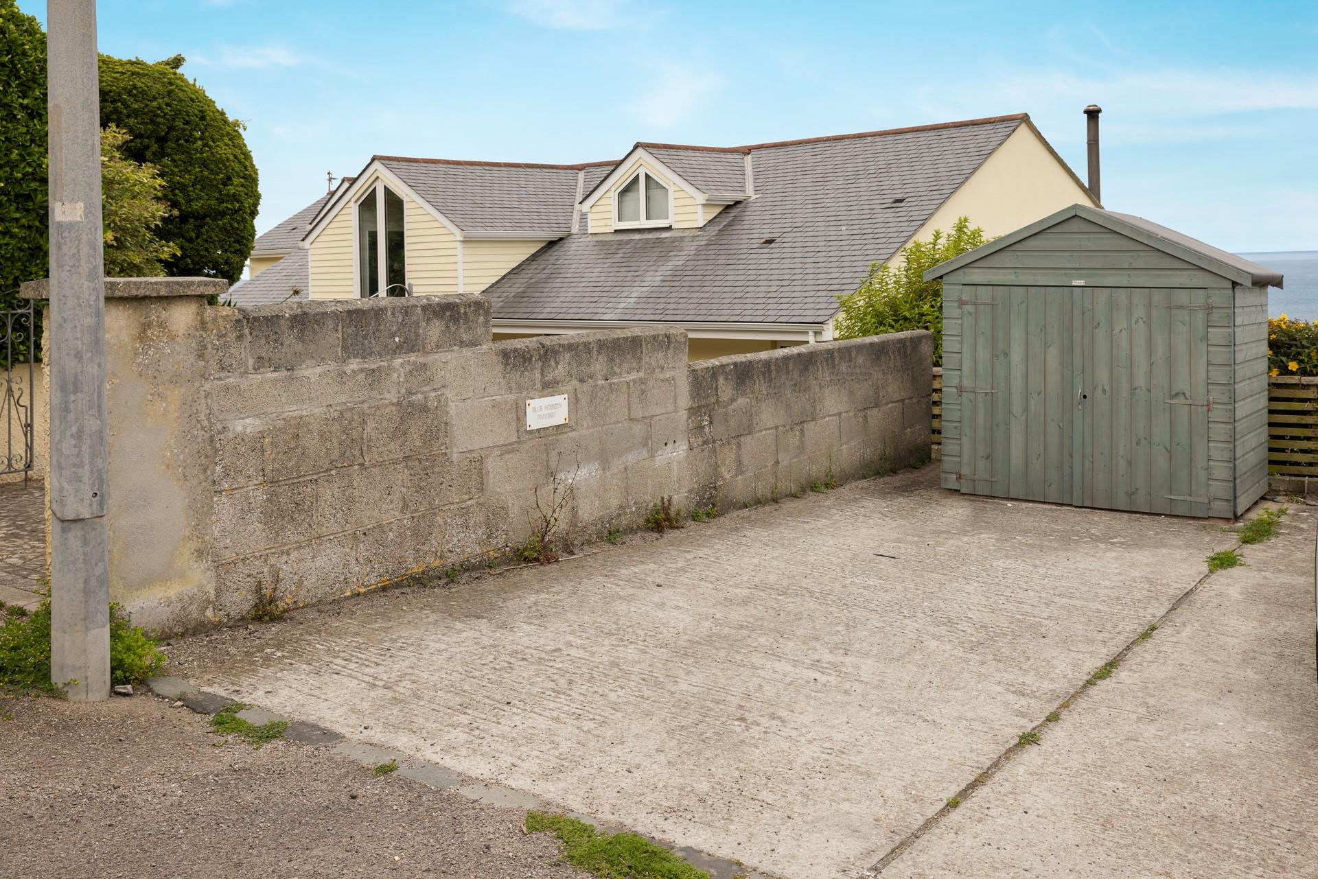 There's a private parking space with storage for all your beach gear.
