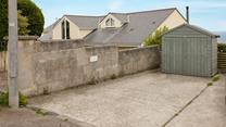 There's a private parking space with storage for all your beach gear.