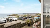The view from the living area looks across to Porthmeor beach.