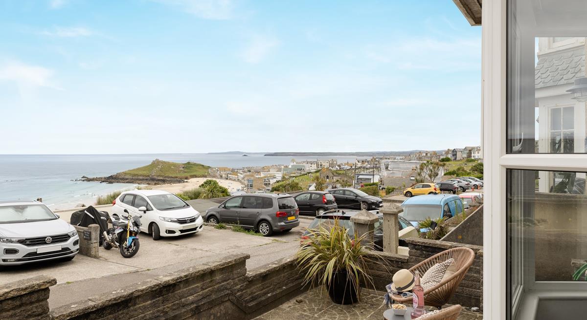 The view from the living area looks across to Porthmeor beach.