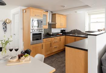 The kitchen has all the modern amenities you need.