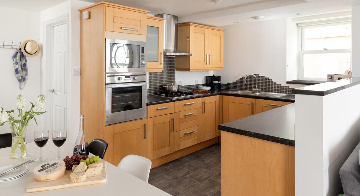 The kitchen has all the modern amenities you need.