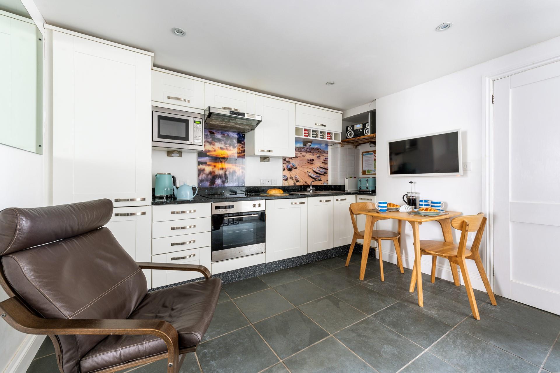 Though compact the living space has been carefully thought out to ensure guests have everything they need and more!