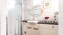 Start your morning in the wonderfully spacious shower or wash away the sand before dinner after a day at the beach.