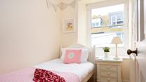 This adorable bedroom is sure to delight children!